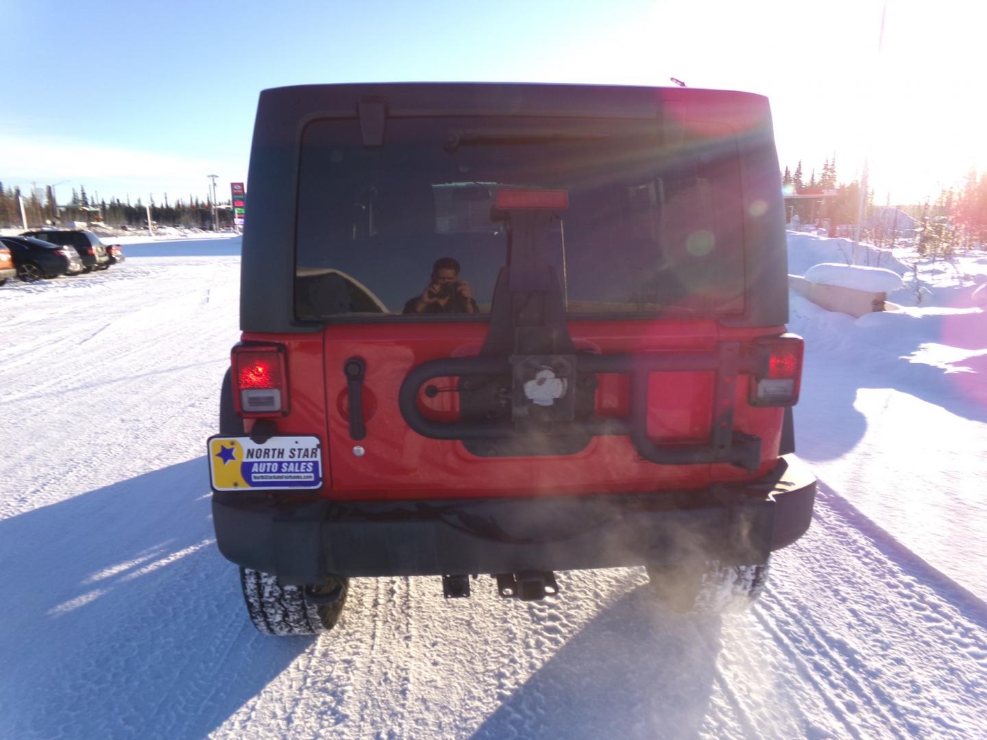 2017 Red Jeep Wrangler Unlimited Sport 4WD (1C4BJWDG9HL) with an 3.6L V6 DOHC 24V FFV engine, 6-Speed Manual transmission, located at 2630 Philips Field Rd., Fairbanks, AK, 99709, (907) 458-0593, 64.848068, -147.780609 - Photo#3